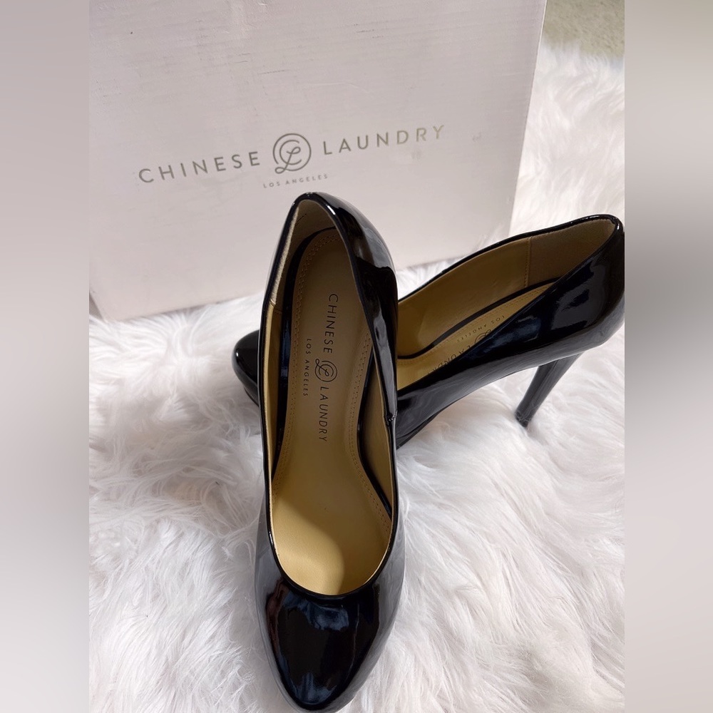 Brand new with box. Chinese Laundry, head turning platform black patent heels.